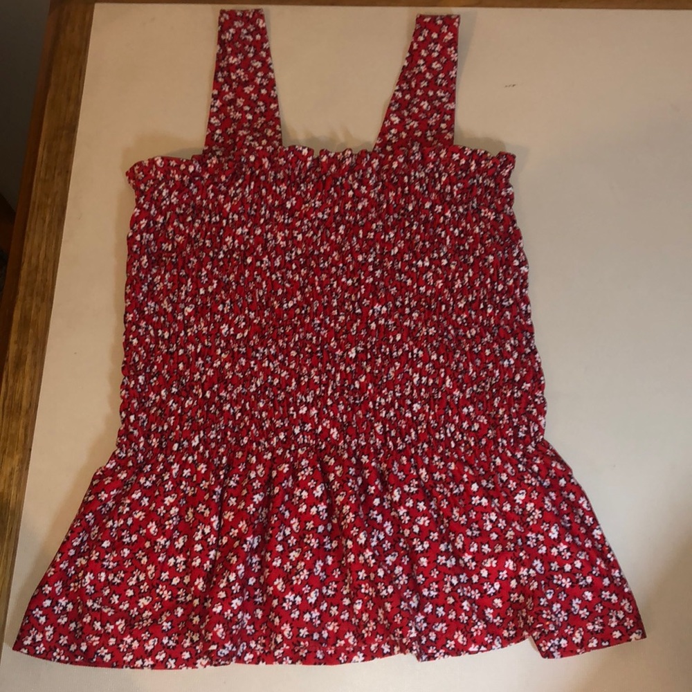White and red tank top with flower design